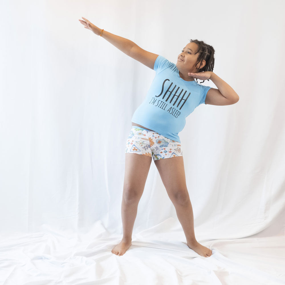 a boy modeling his wunderundies on a white backdrop