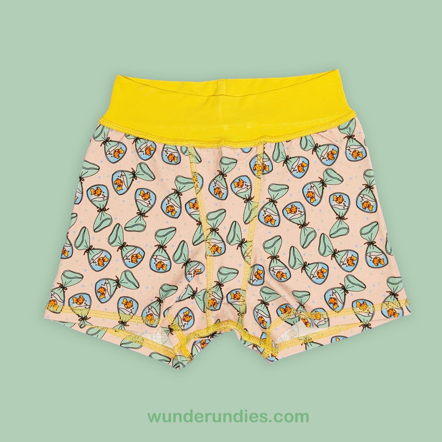 flat seamed boxer shorts with a yellow waistband and a print featuring fishies in bags