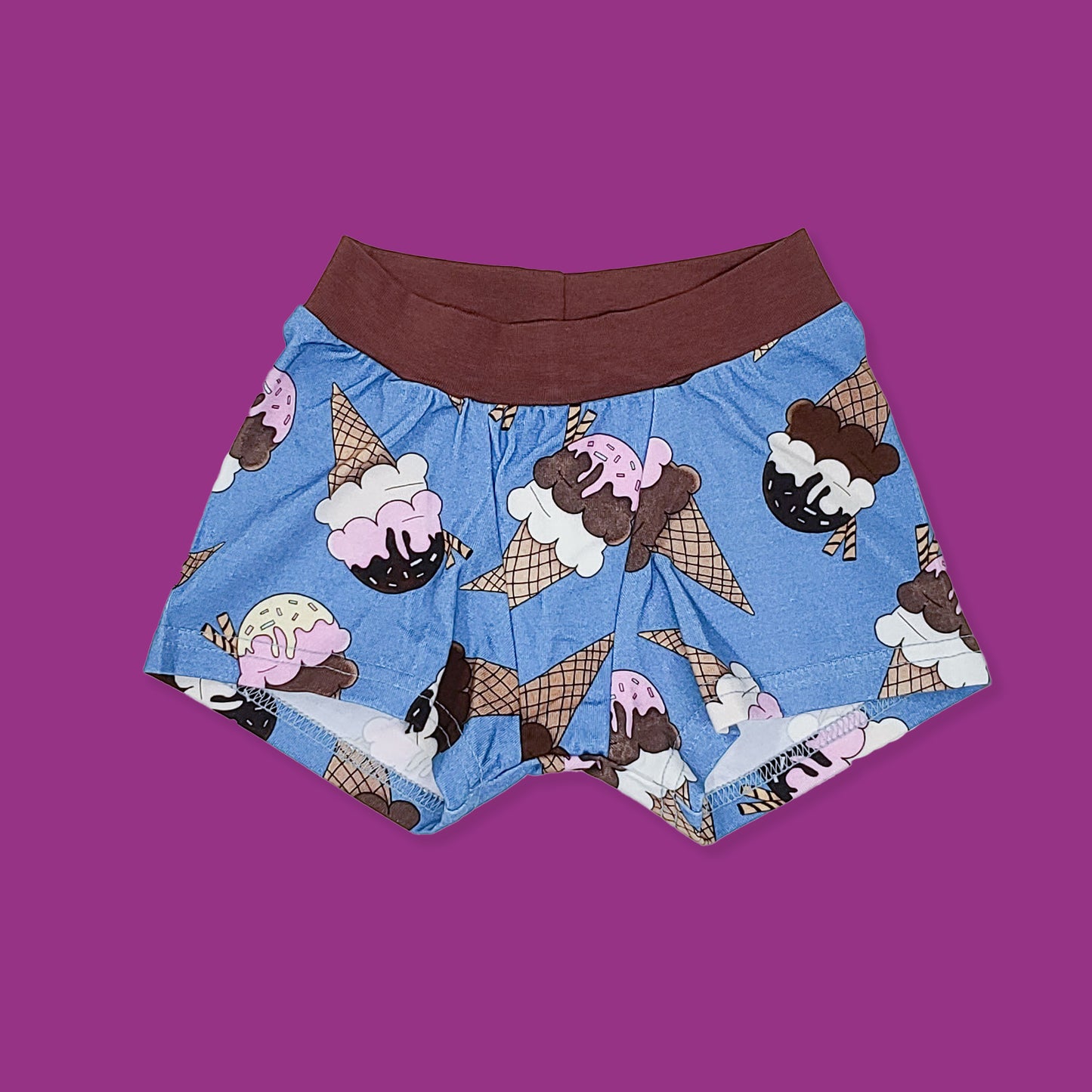 wunderundies boxers - gender neutral undies for kids - with a design of ice cream on a blue background on it