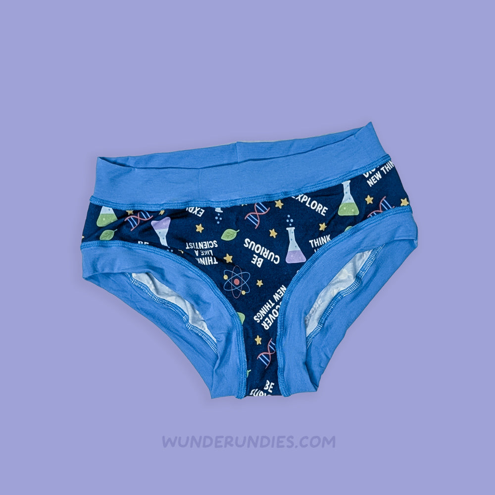 Blue  adult sensory friendly underwear with educational design on a purple background